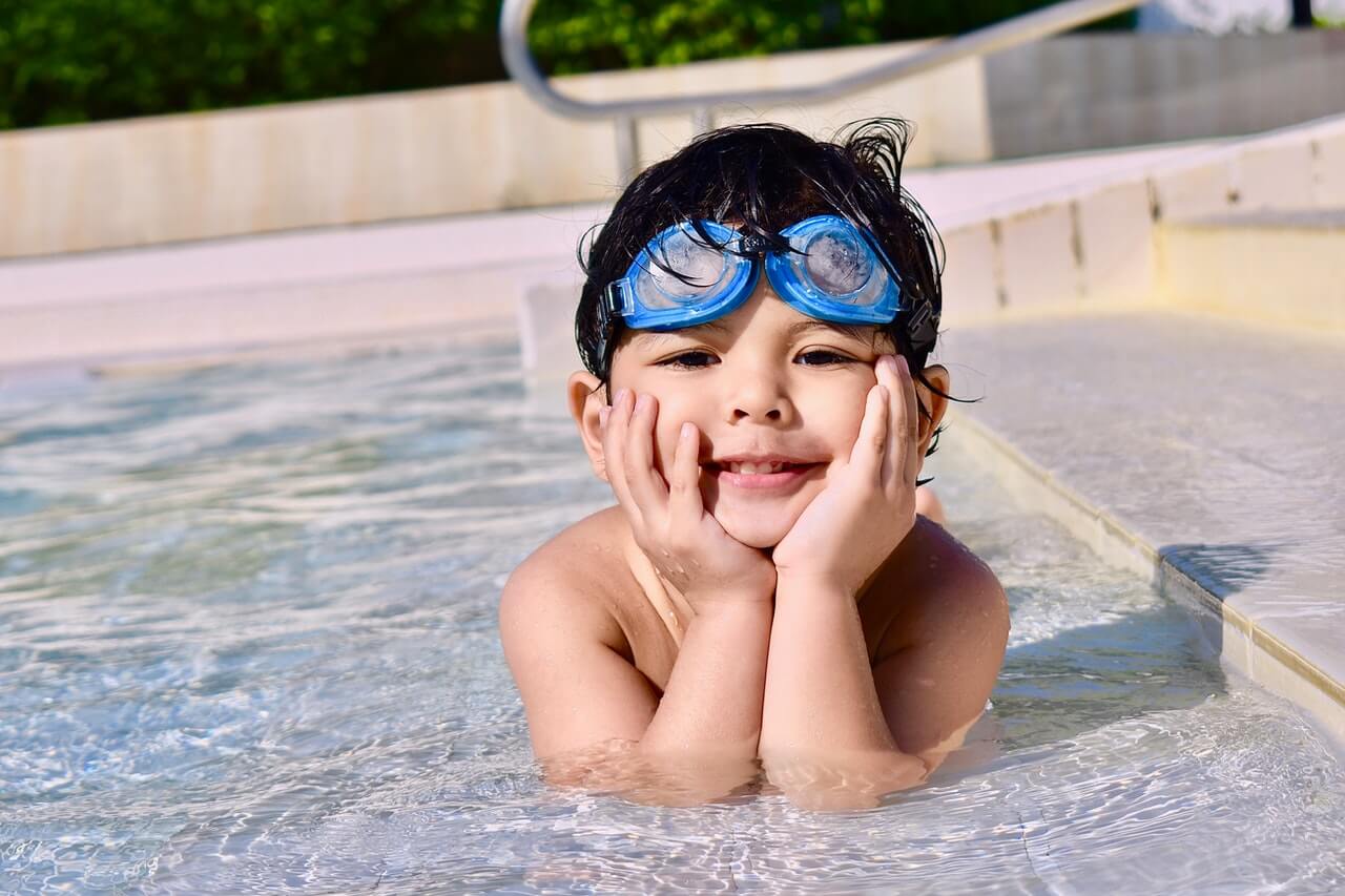Happy child at the pool