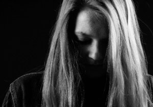 Emotional girl feeling bullied and alone