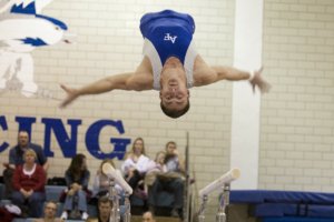 gymnastics class back layout on bars